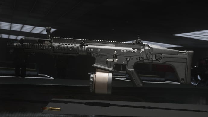 A close-up of the TAQ Eradicator LMG in the Modern Warfare 3 Gunsmith screen.