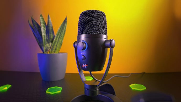neat bumblebee 2 microphone on a desk showing its small stature